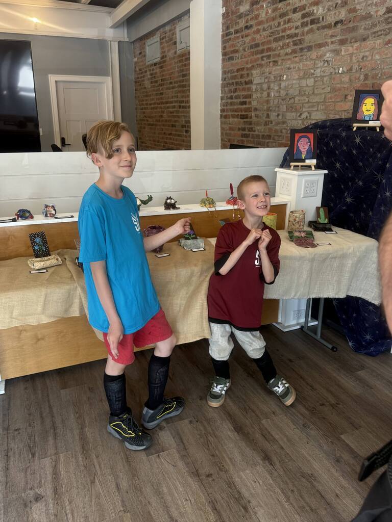 Students with their artwork.