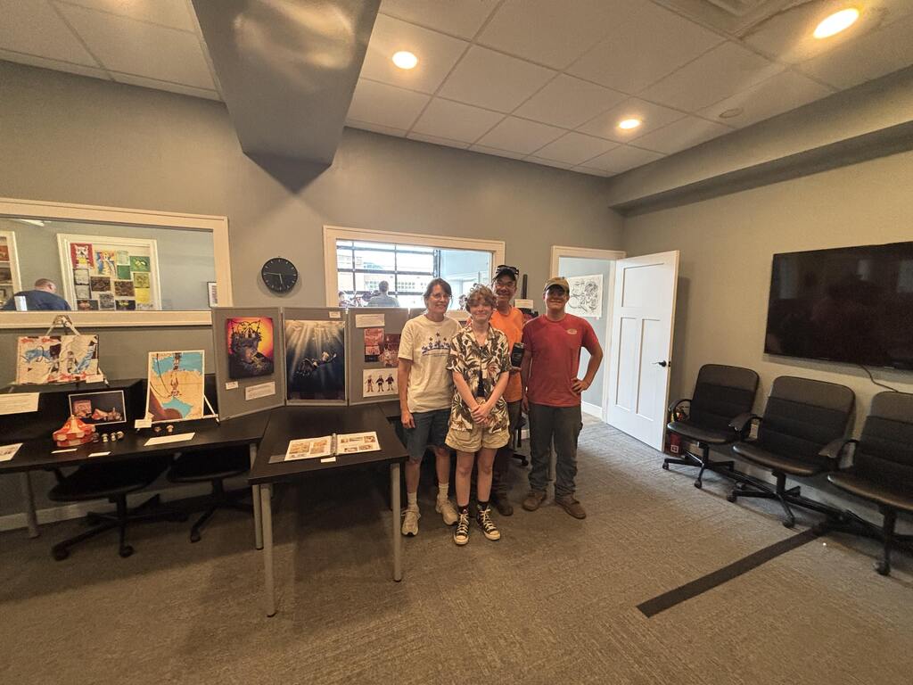 Students with their artwork.