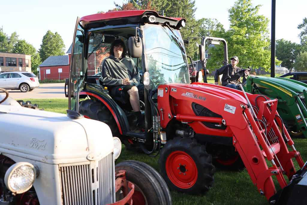 students in their tractors. 