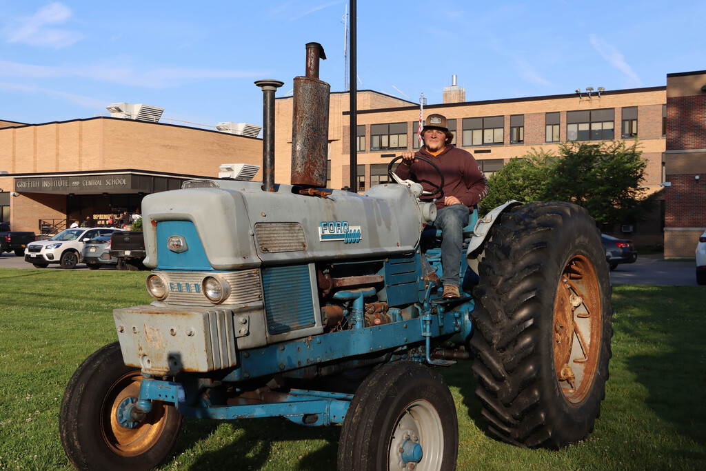Student on a tractor