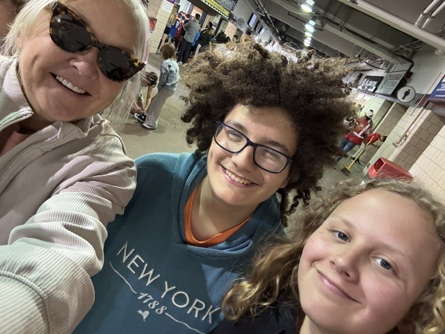Students and a teacher at the game.