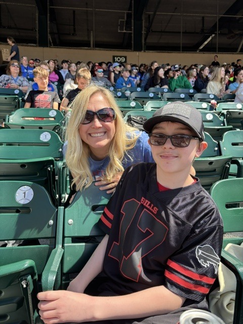 Student and a teacher at the game.