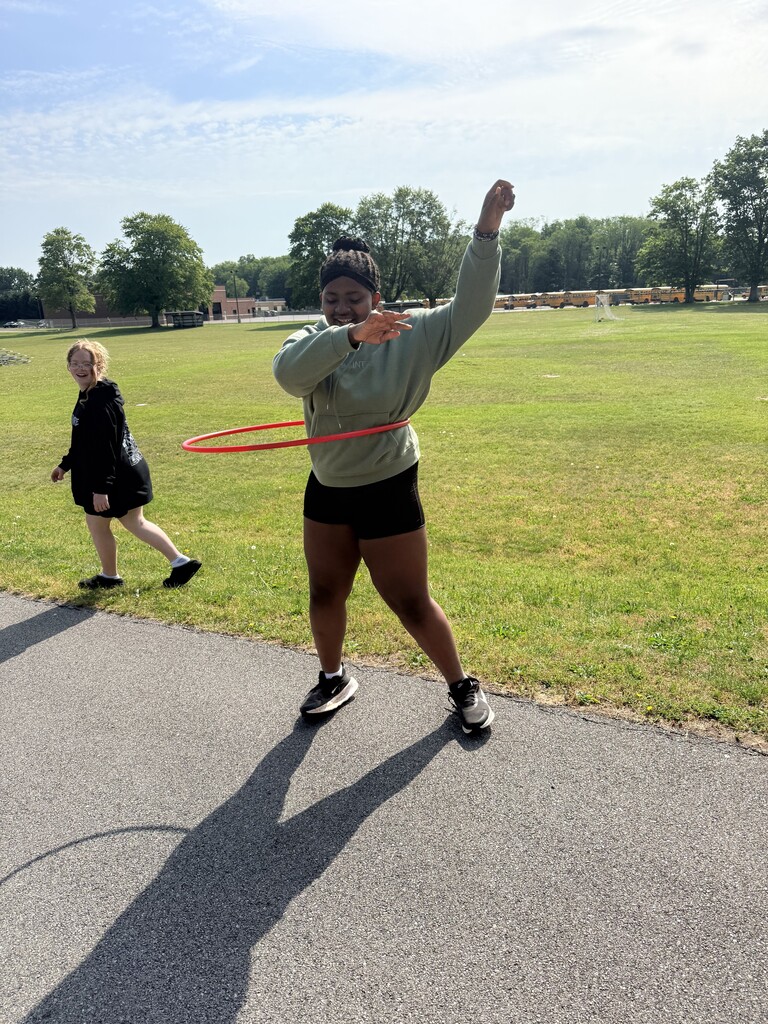 A student hula hoops.