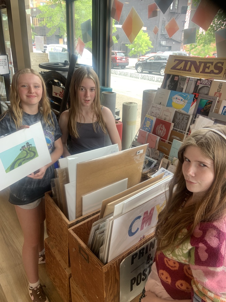 Students look at prints.