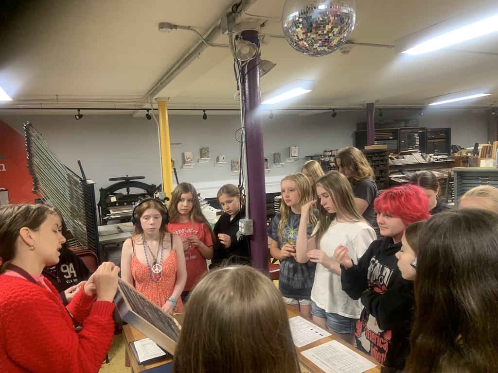 Students learn about screen printing.