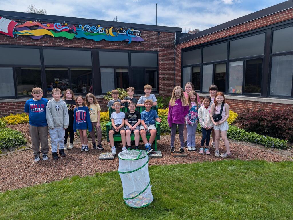 students release butterflies outside. 