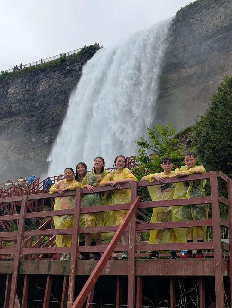 students on the cave of the winds.