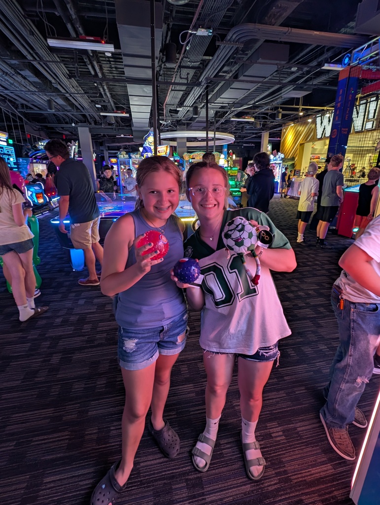 Girls in the arcade.