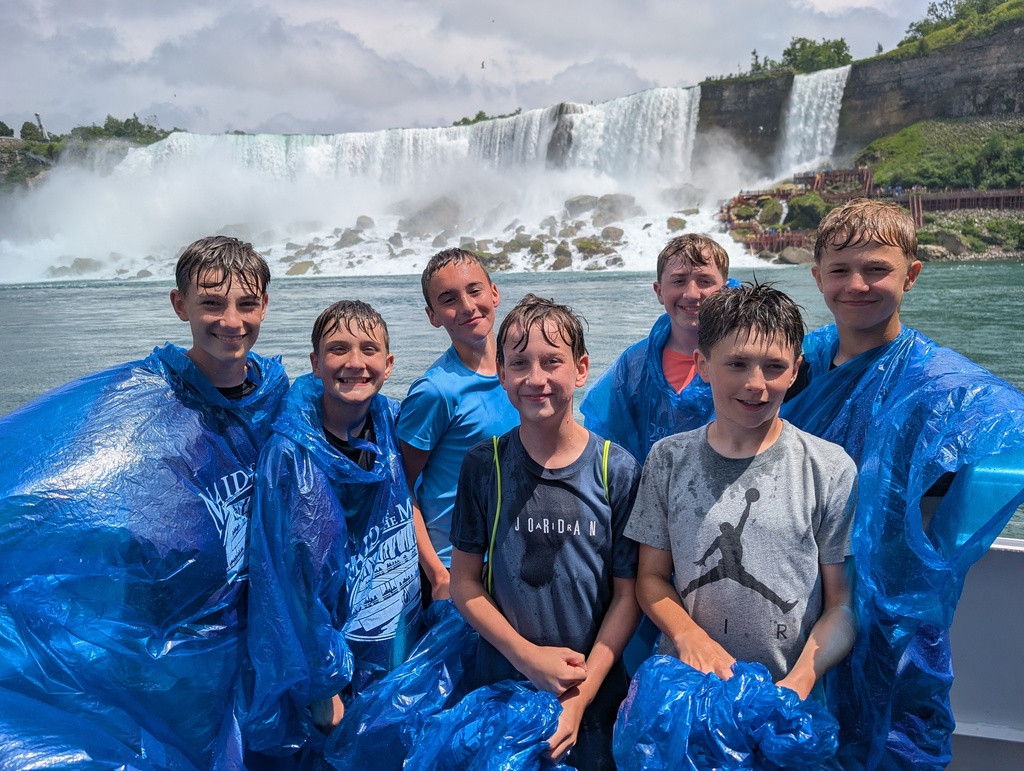 Boys in front of the falls.