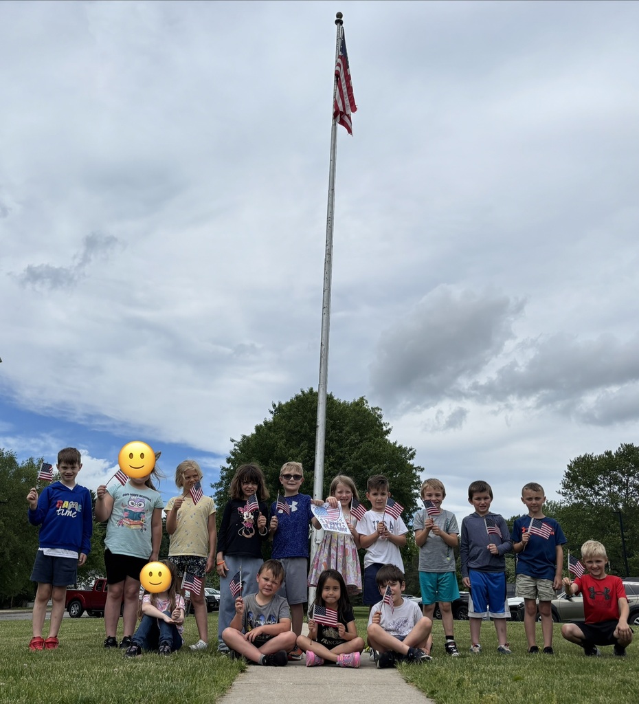 Students at flag pole.