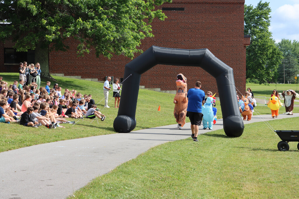Teachers in costumes fun run. 