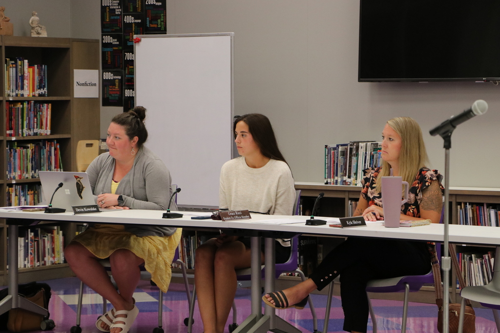 Grace Ricci at the board table.