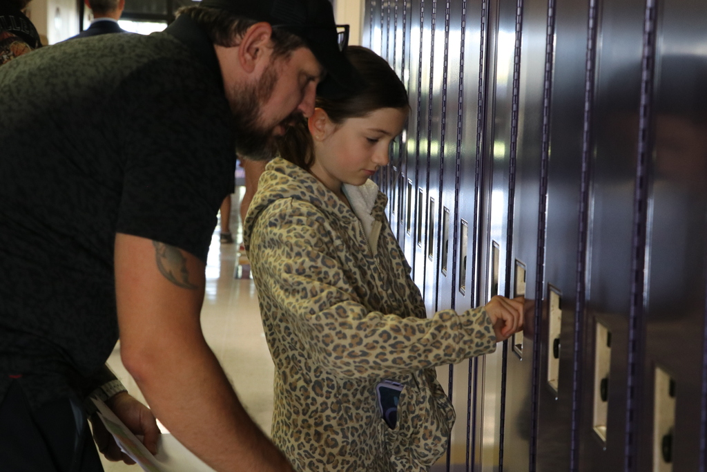 Student opens locker