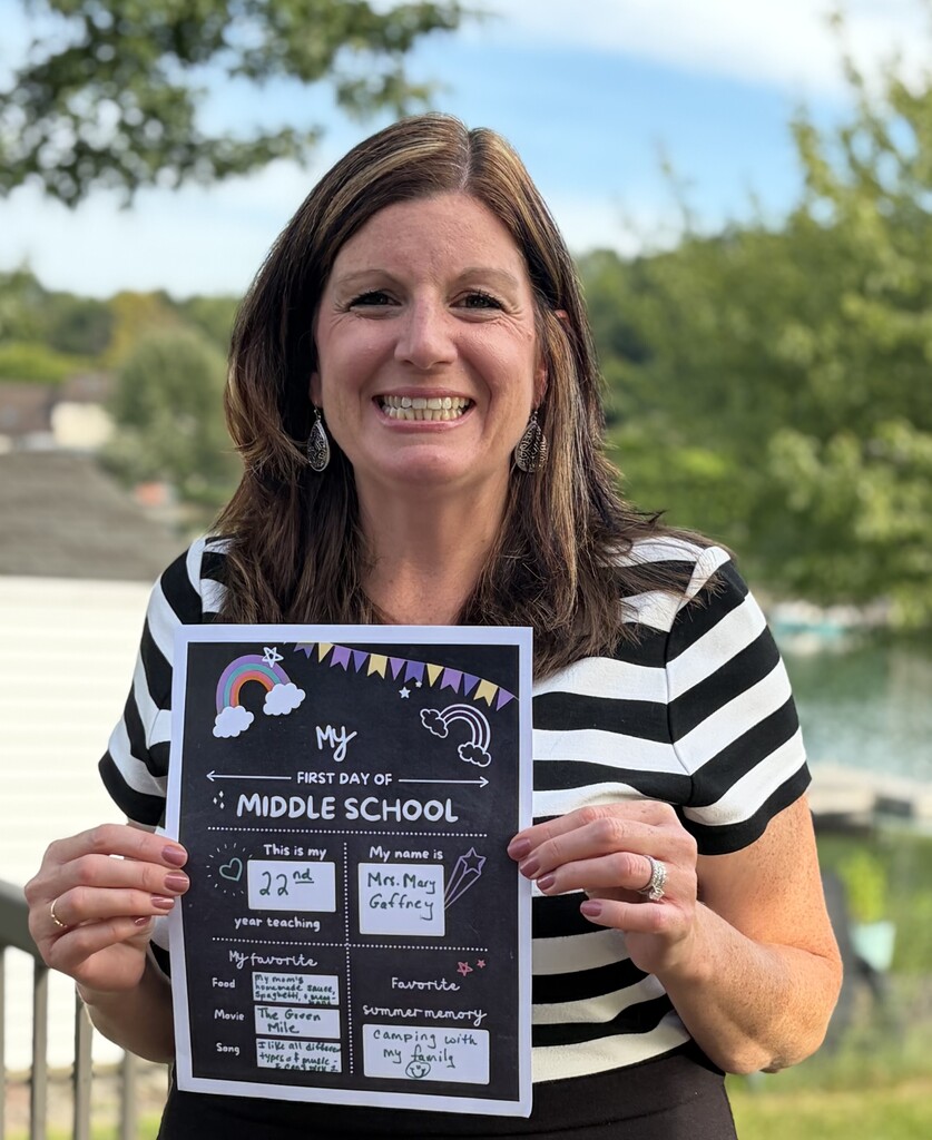 Mrs. Gaffney with her back to school flyer