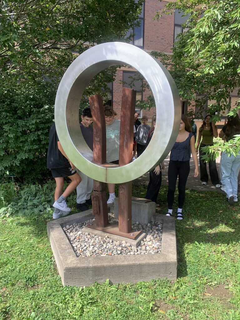Students at 9-11 Memorial sculpture