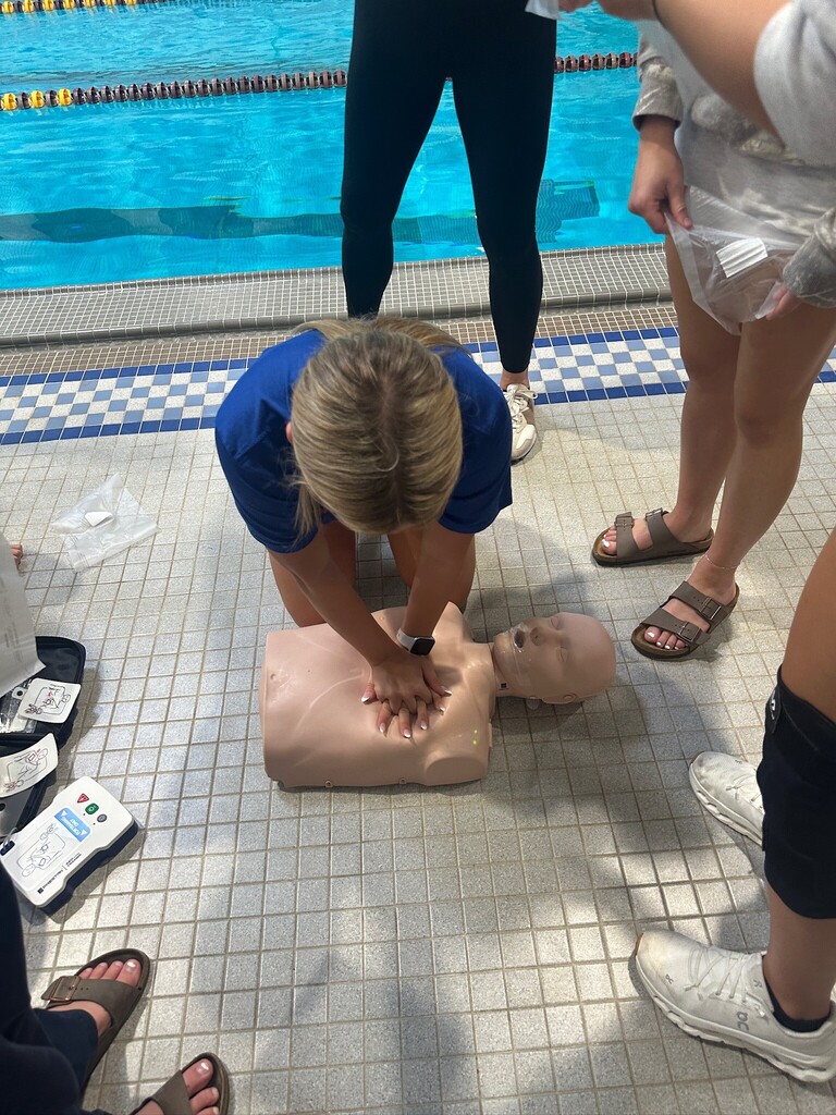Student practices CPR.
