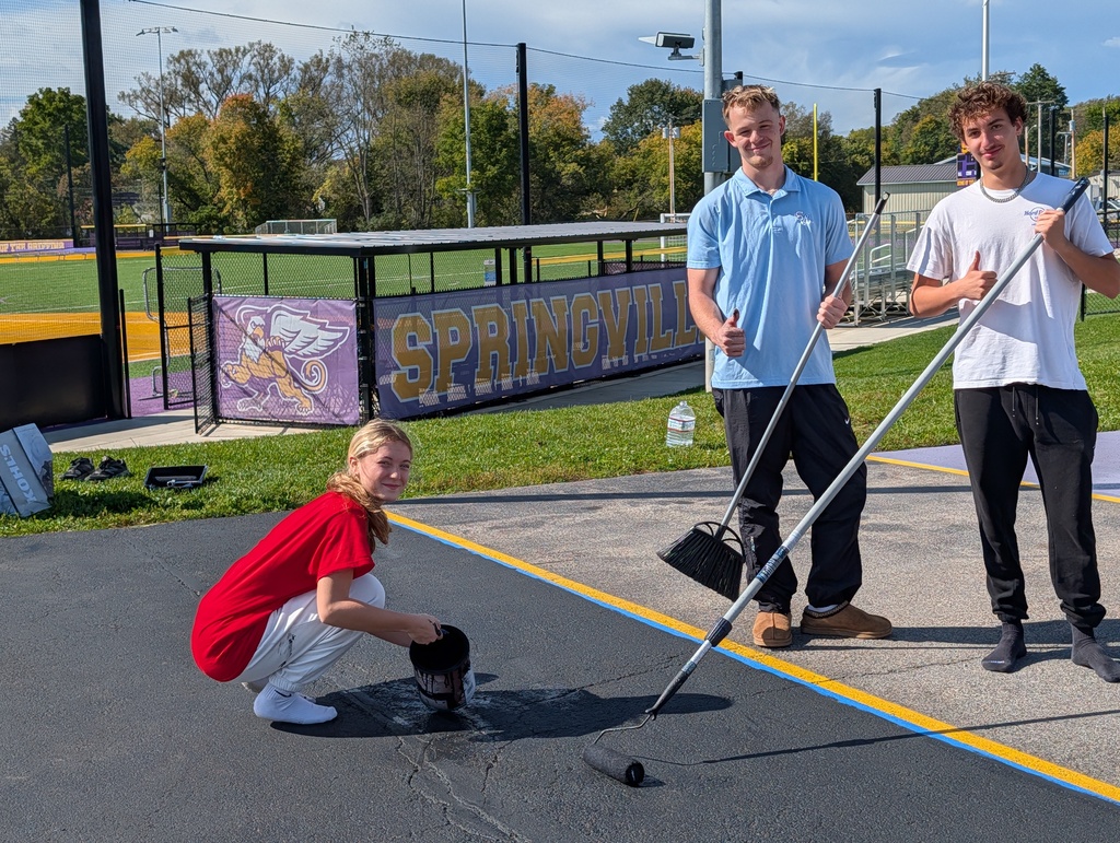 Students paint parking spots 
