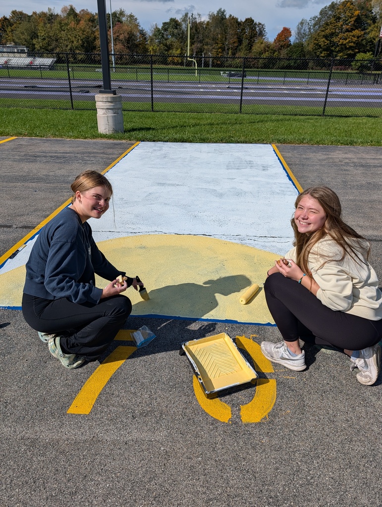 Students paint parking spots 