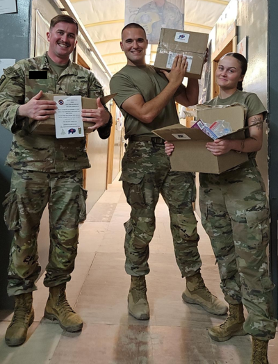 service members with packages