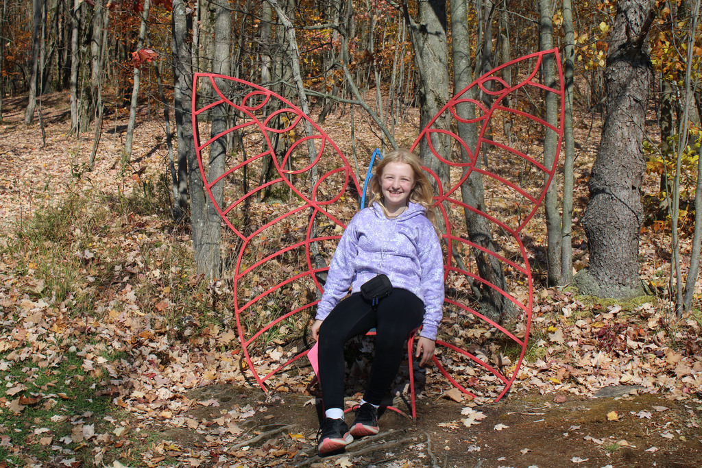 Student with wings sculpture