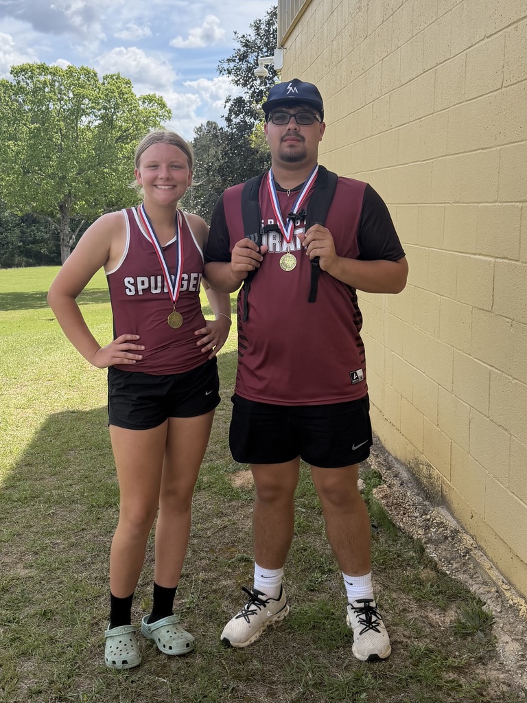 Tennis 2 players with medals around their neck
