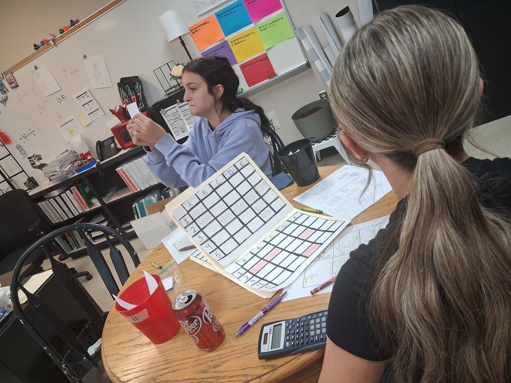 math squd battle ship game in action with paper and squares instead of the real battleship game