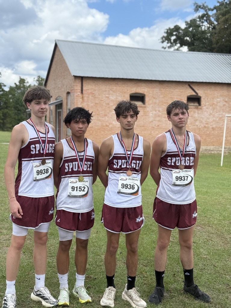 cross country boys with medals