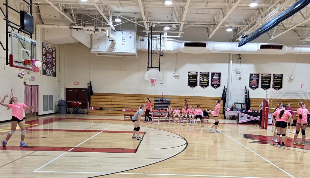 Tatum Kirkland starts Varsity off with a strong serve.