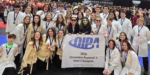 BAND KIDS HOLDING BANNER