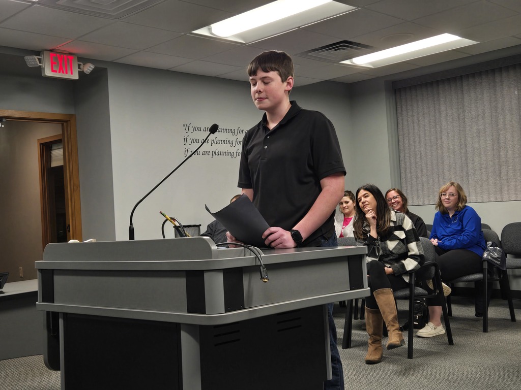 Middle School Student Evan reads poetry that he competed with at the Middle School Competitive Speech competitions
