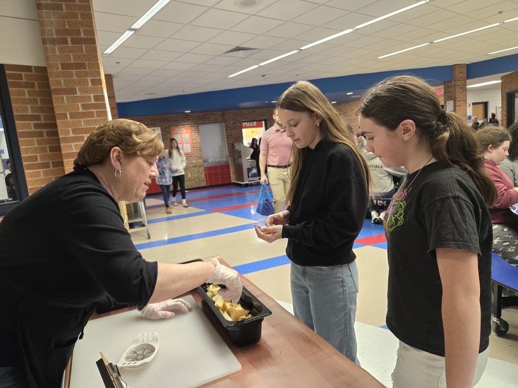 Middle school students tasting Apple Pears
