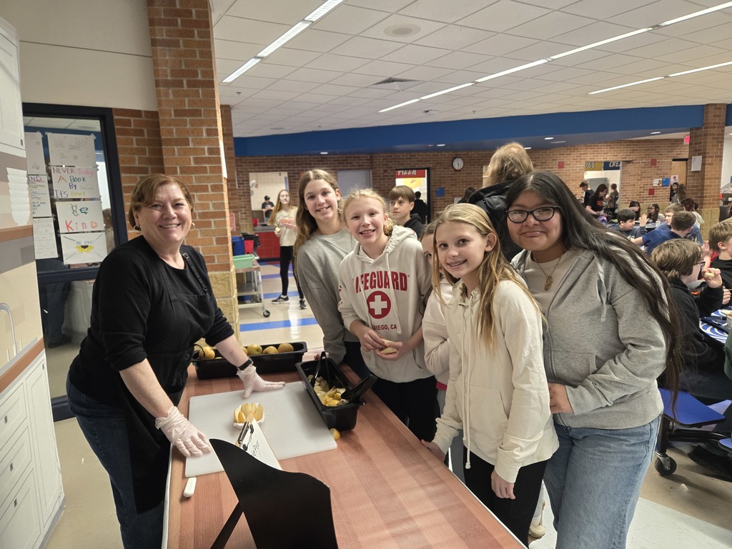 Middle school students tasting Apple Pears