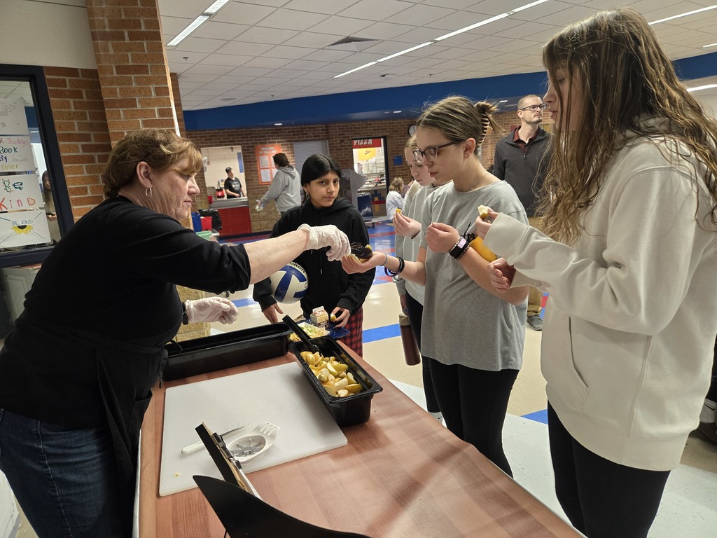Middle school students tasting Apple Pears