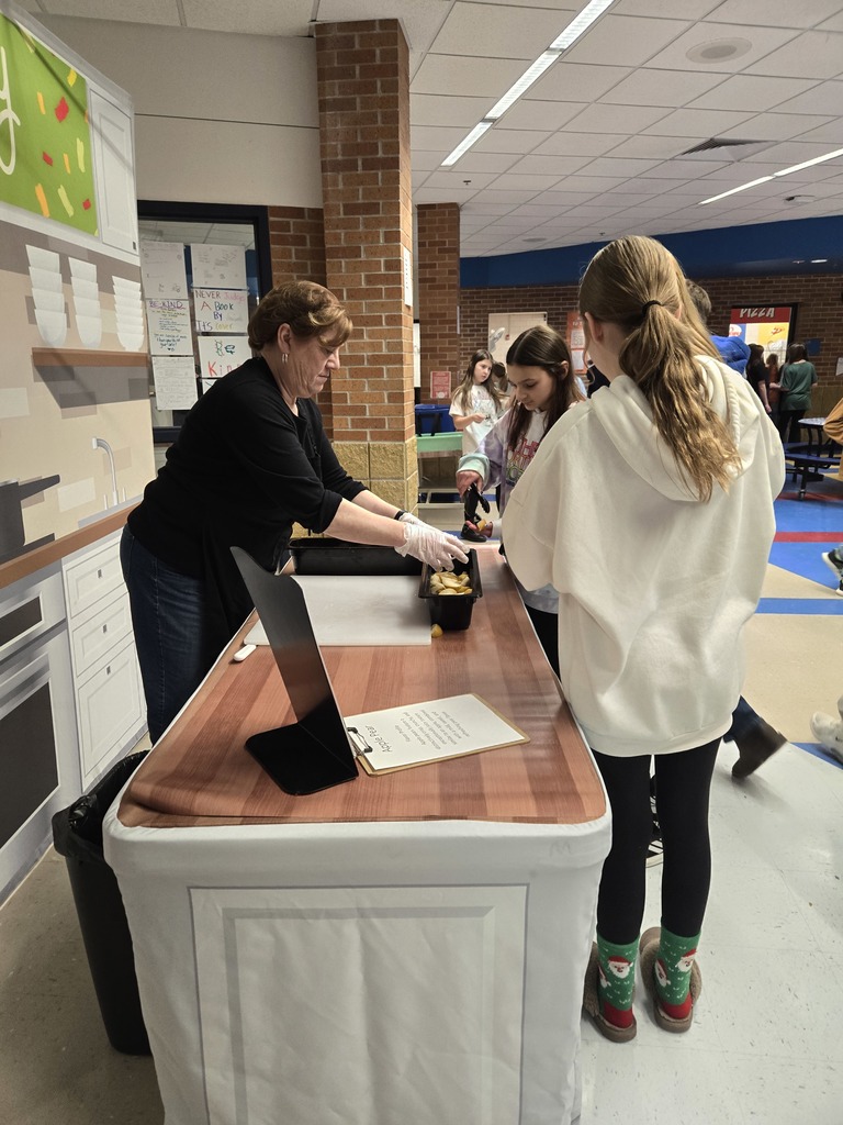 Middle school students tasting Apple Pears