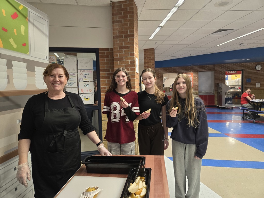 Middle school students tasting Apple Pears
