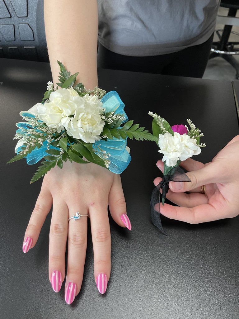 Basic Floral Design students learning about color and the basics of corsage and boutonniere construction