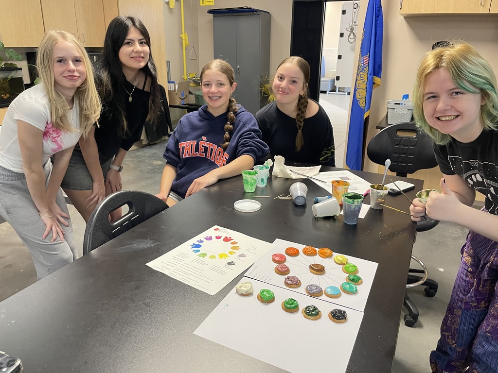 Basic Floral Design students learning about color and the basics of corsage and boutonniere construction