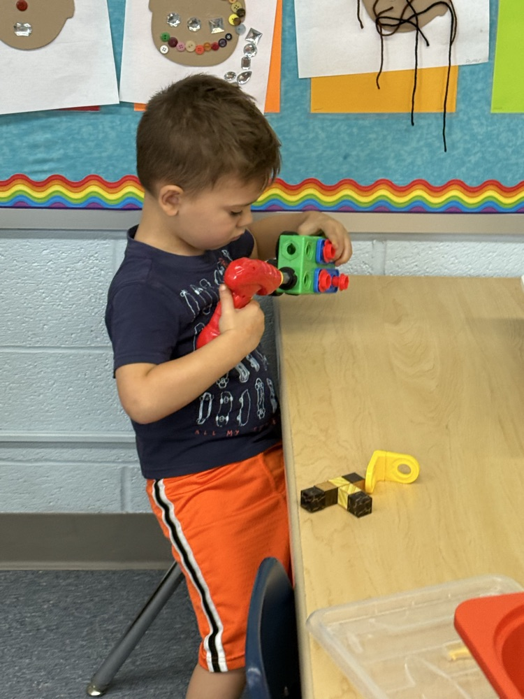 using the power drill toy
