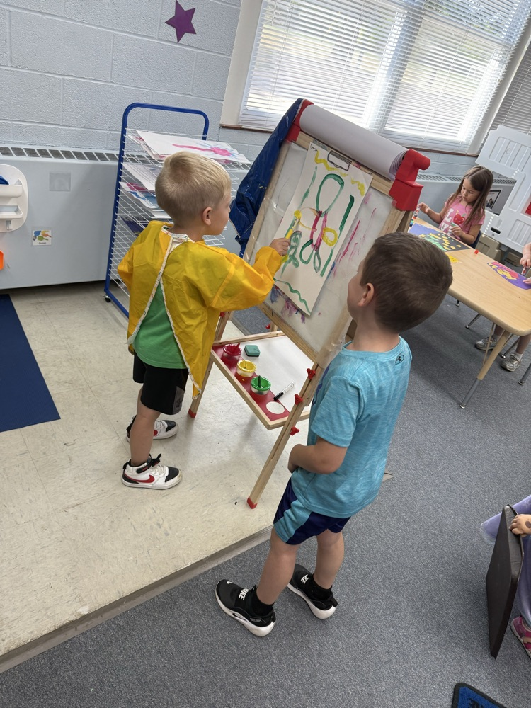 painting at the easel