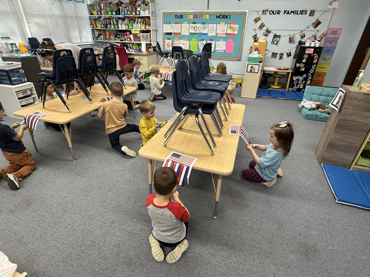 cutting the lines to make our flag wind socks