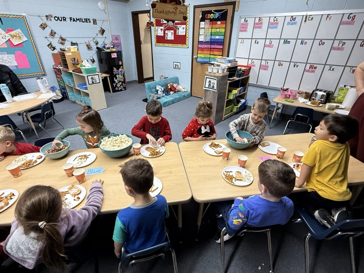 helping the friend next to us by holding the bowl while they scooped what they wanted.