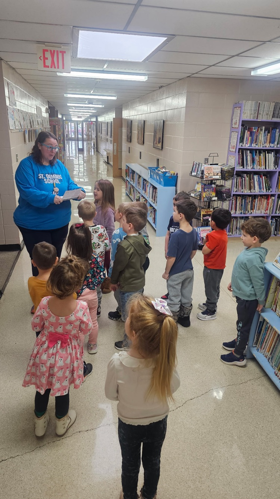 our gingerbread man ran away when I went to check on him in the oven. there were clues around the school we had to listen and figure out where he went to next.