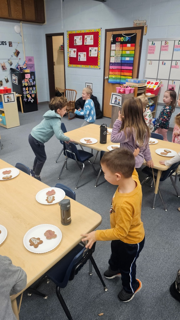 at the end he left us gingerbread cookies for snack.. some kids said that was him and some said he got away but left us those. I left it for them to decide.