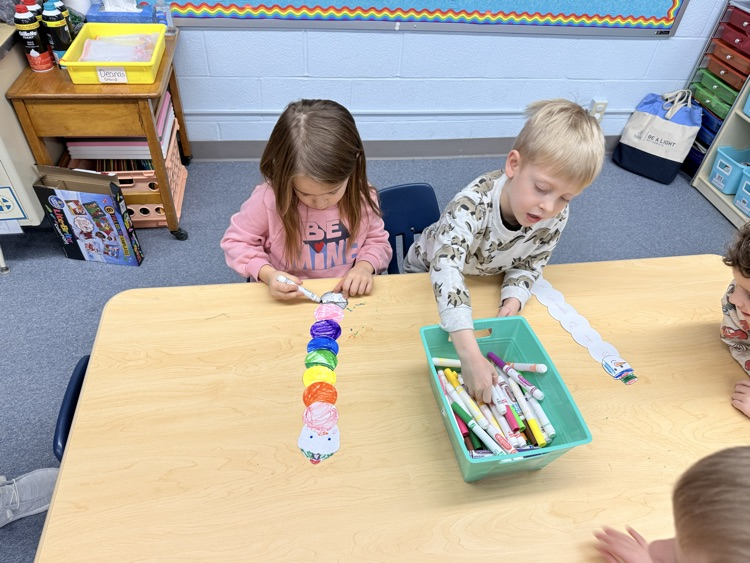 we made snowman names and designed them too after writing our name letters on them! 