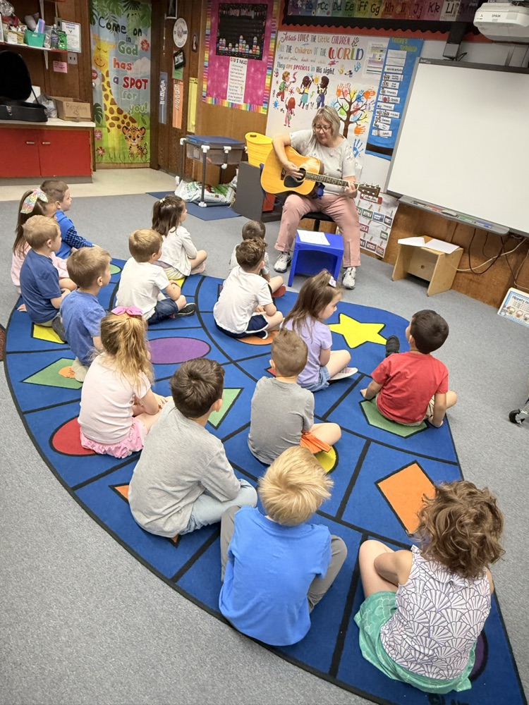 Mrs. Stegeman played the guitar for us on music Monday 