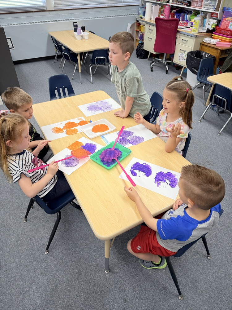 we we used flyswatters to paint on artsy Thursday 