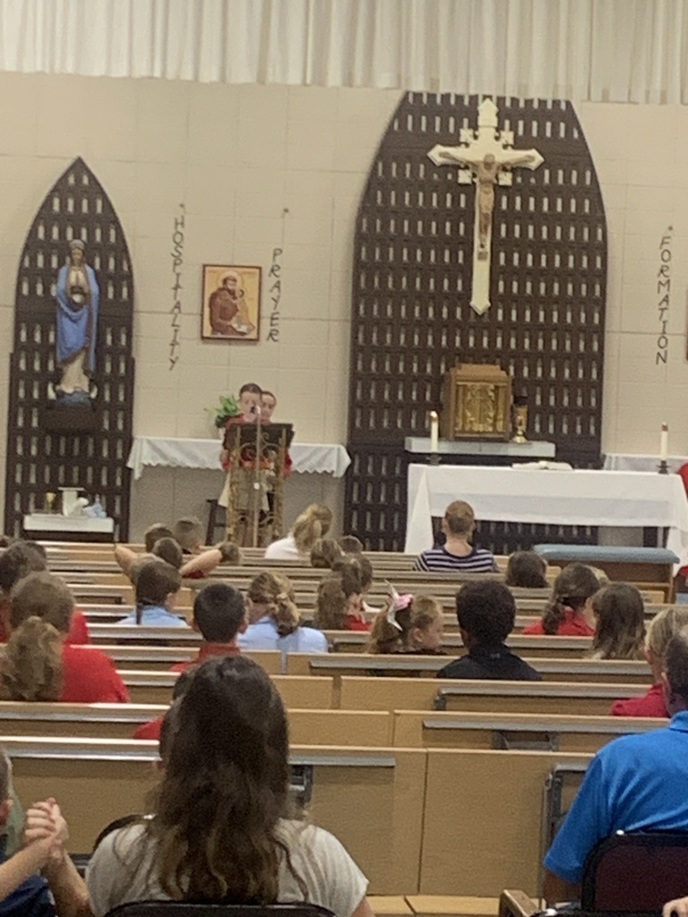 Fifth grade leaders at School Mass on Wednesday, September 16, 2026, reading the Petitions.
