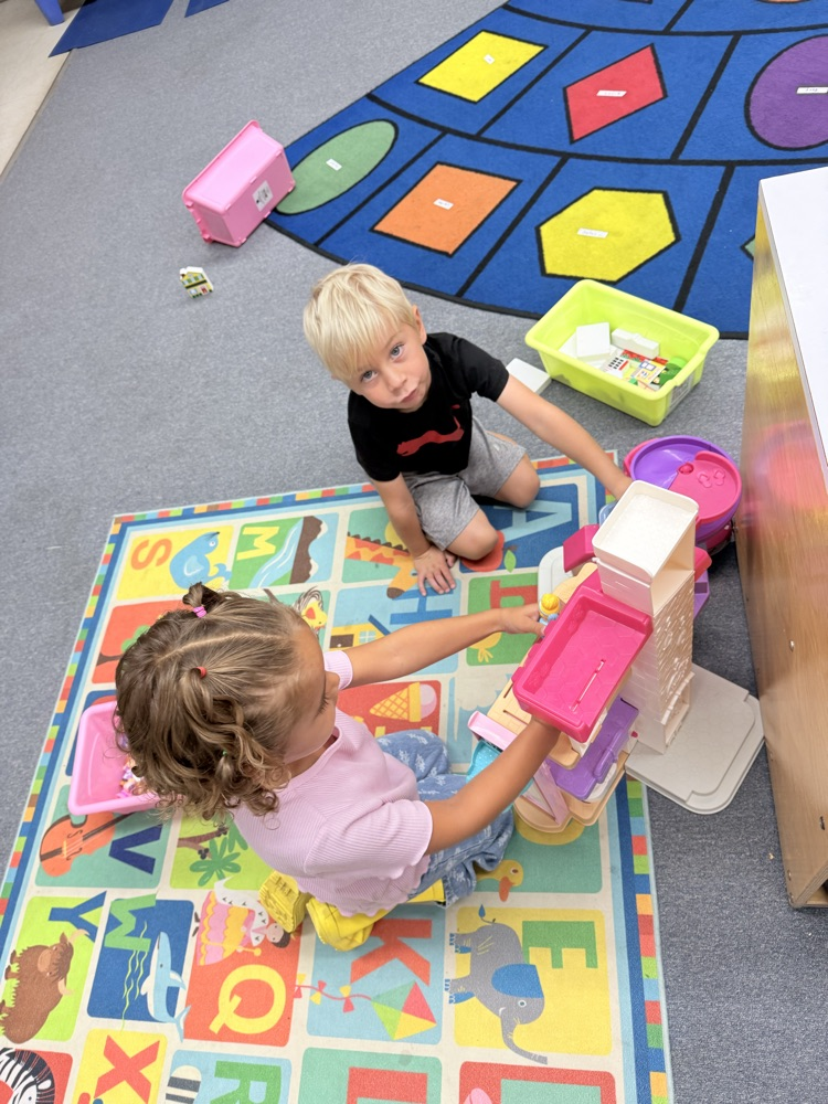 playing with the little people Barbie house 