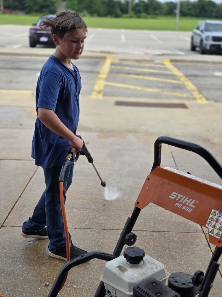 Middle school students get their building ready for the school year. 