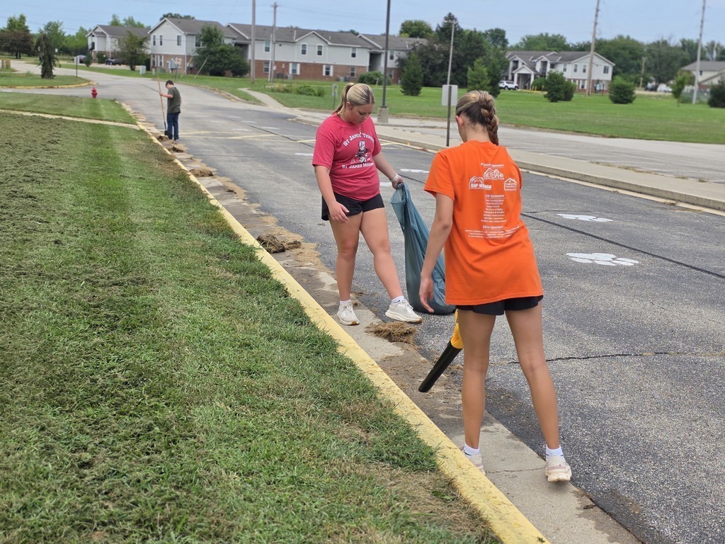 Middle school students get their building ready for the school year. 